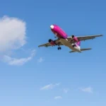 How do I talk to a person at Qatar Airways